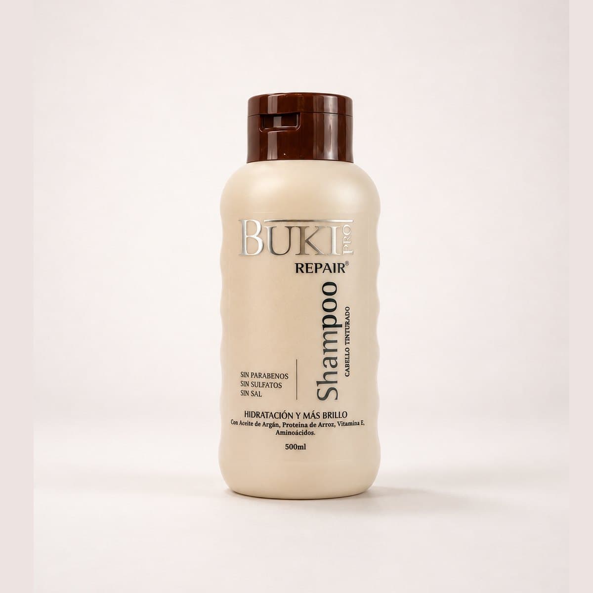 Shampoo Repair de 500 ml de Buki Pro para cabello tinturado, frasco beige con tapa marrón.